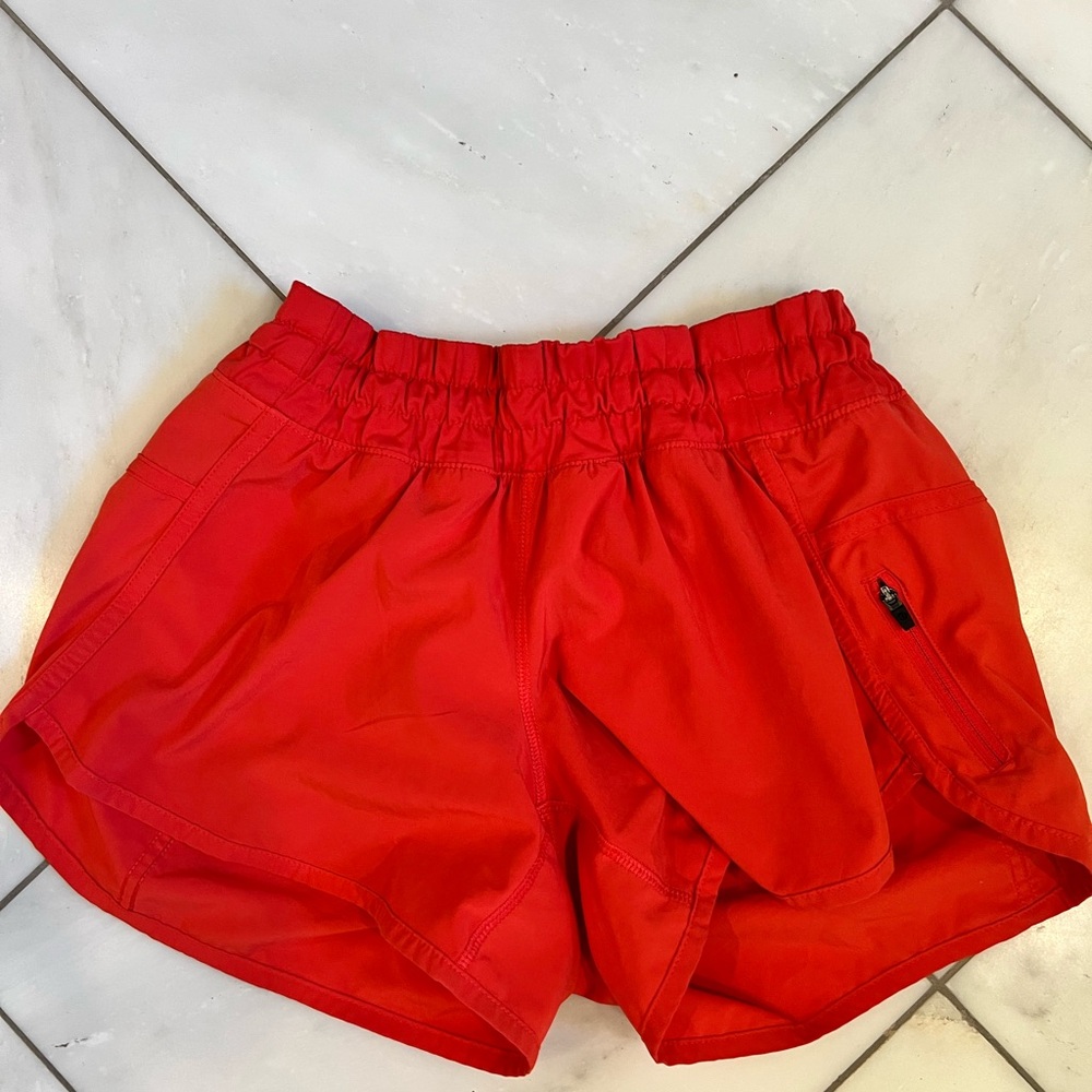 Lulu orange/red athletic shorts size 4.
